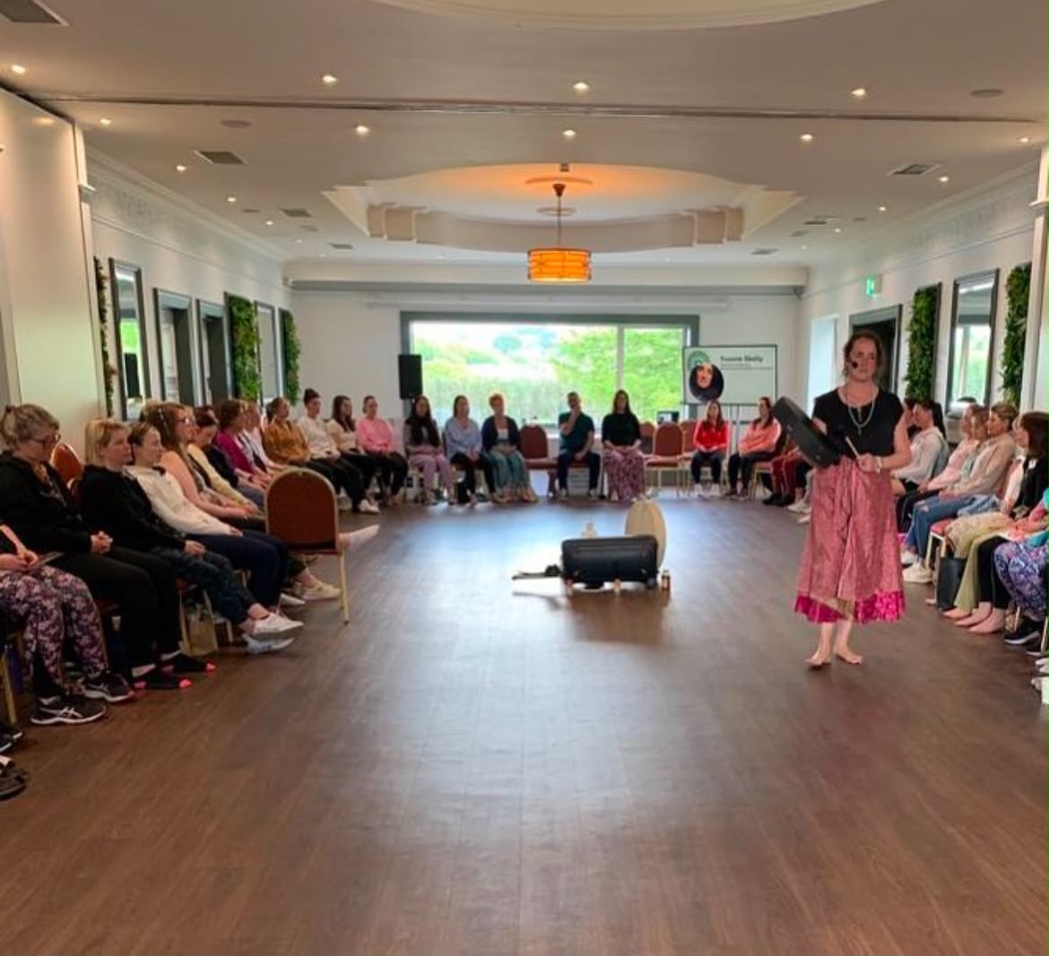 A facilitator leading a workplace group wellness session