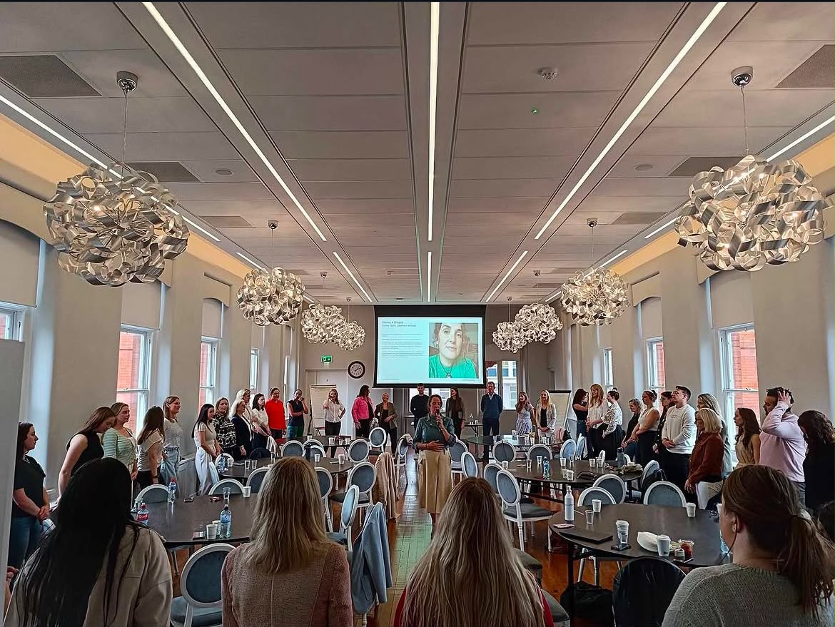 A workplace wellness session taking place at a live event